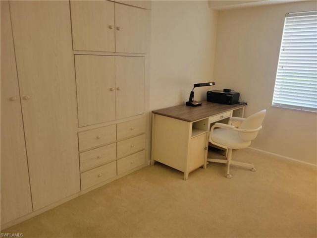 Den with built-in closet, drawers and TV enclosure