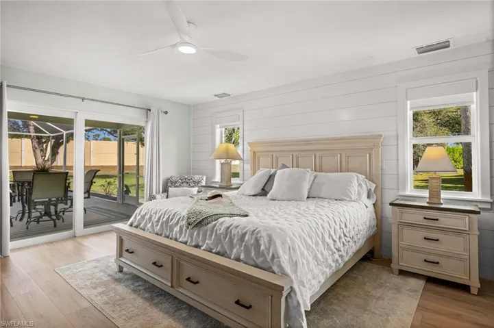 A tranquil sanctuary with sliding glass doors to the lanai, perfect for quiet mornings, evening breezes, and effortless indoor-outdoor living.