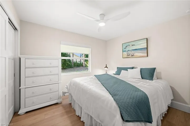 Serene and welcoming, this guest bedroom offers fresh natural light, soothing tones, and a relaxing atmosphere for visitors.