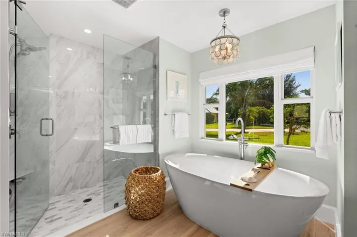 Retreat to a sanctuary of stone, glass, and light, where spa-worthy finishes and nature-facing windows create the perfect space to slow down and breathe.