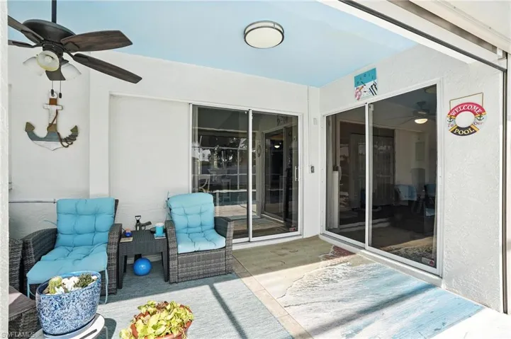 View of pool featuring a patio, a grill, a lanai, and ceiling fan