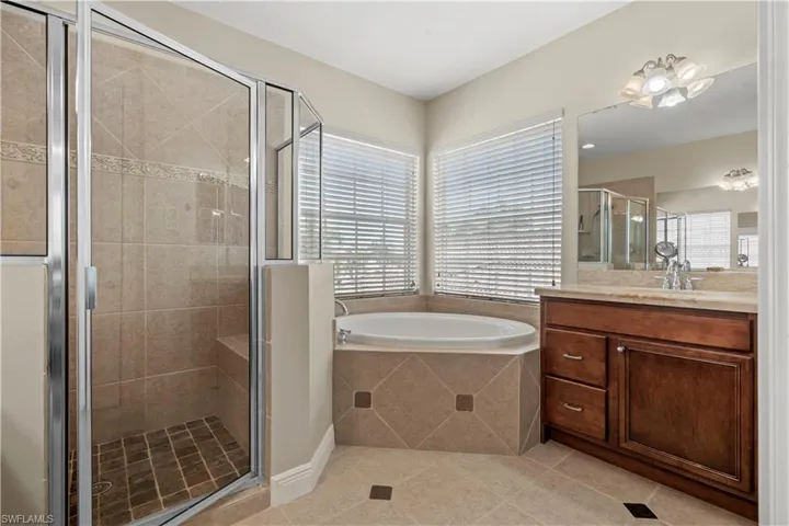 Large step in shower and soaking tub