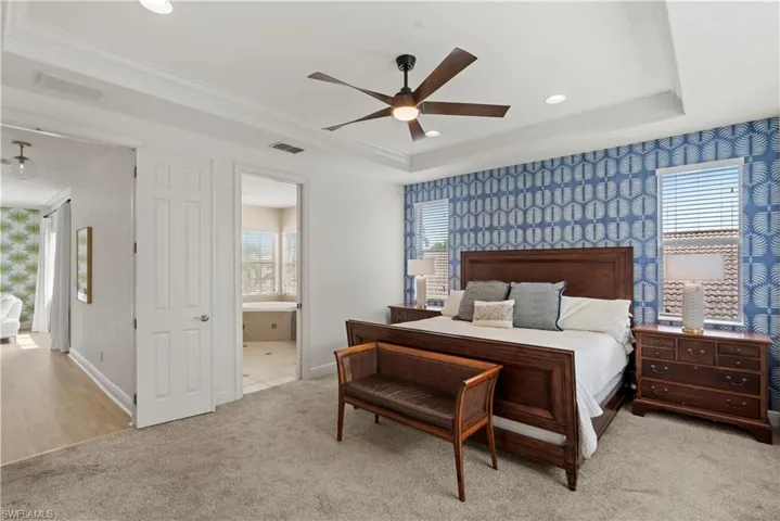 Master bedroom, door leads to ensuite bath