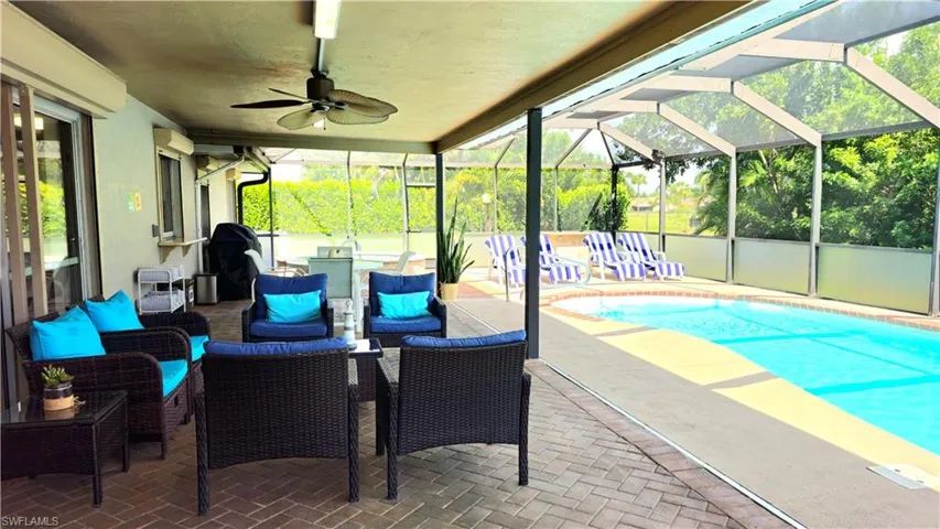 View of patio / terrace with ceiling fan, outdoor lounge area, and a lanai