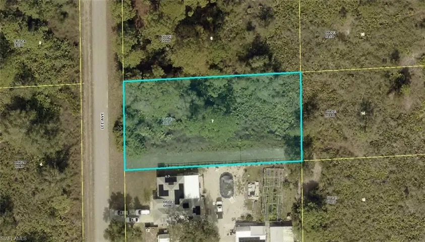 Aerial map of property and surrounding area featuring property parcel outlined