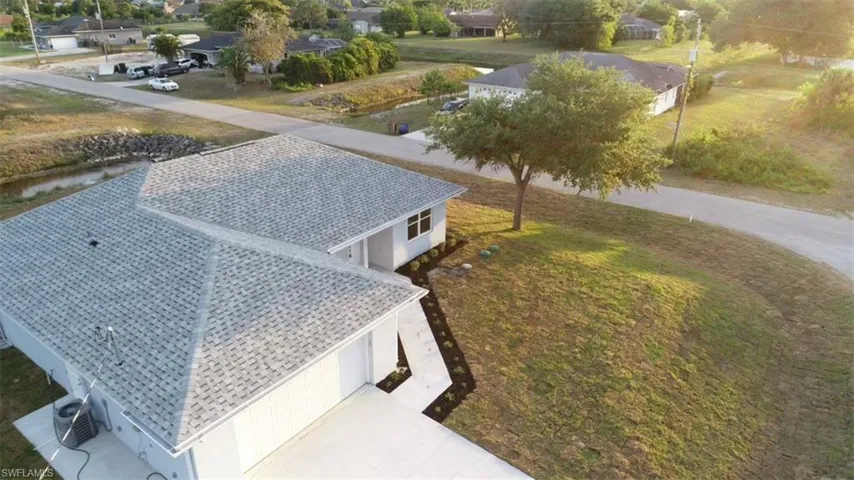 702  Manhattan E ST, Lehigh Acres, FL 33974