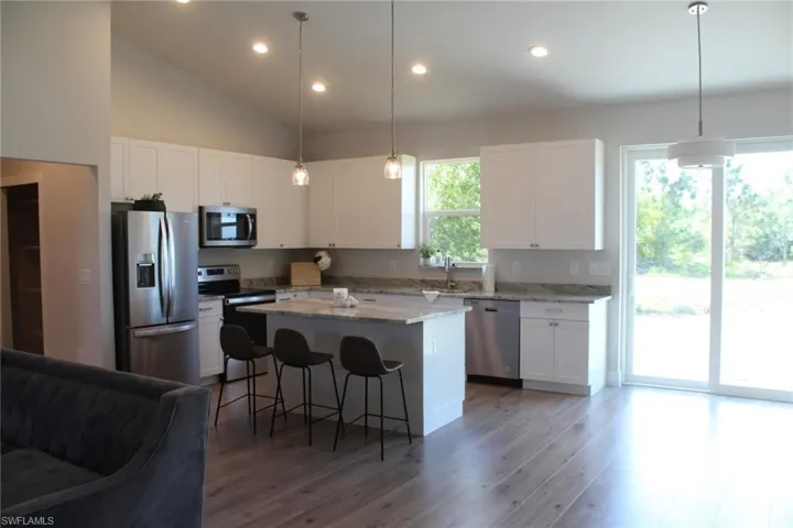 702  Manhattan E ST, Lehigh Acres, FL 33974