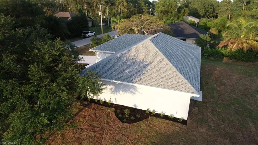 702  Manhattan E ST, Lehigh Acres, FL 33974