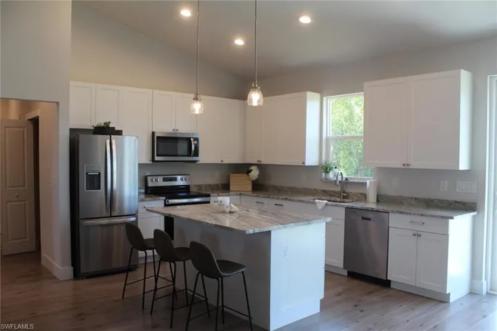 702  Manhattan E ST, Lehigh Acres, FL 33974