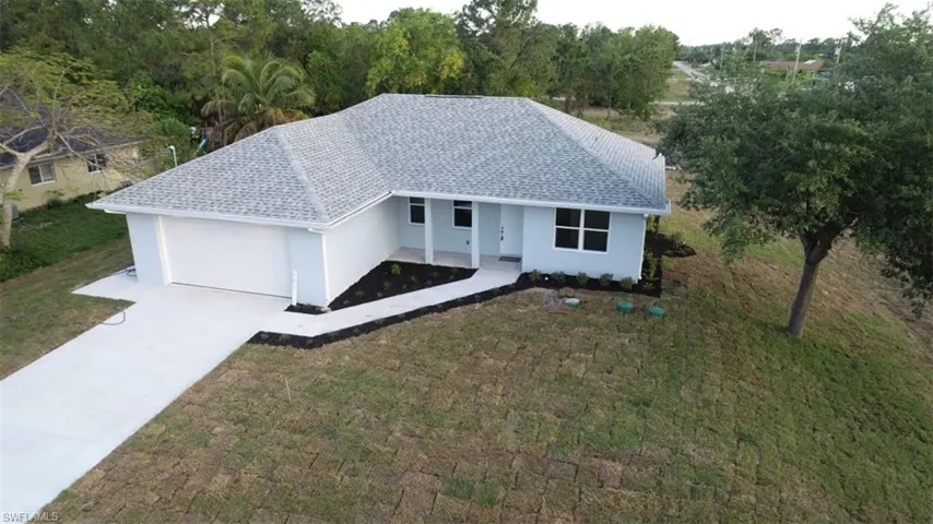702  Manhattan E ST, Lehigh Acres, FL 33974