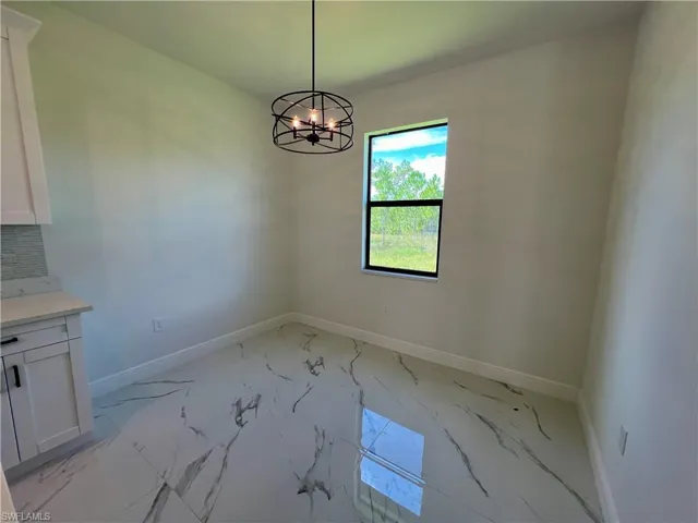 Dining area featuring an inviting chandelier