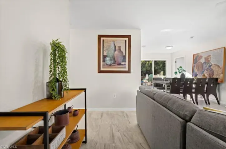 Living area featuring baseboards