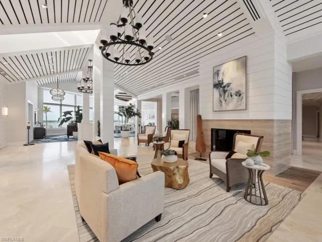 Lobby featuring high vaulted ceiling