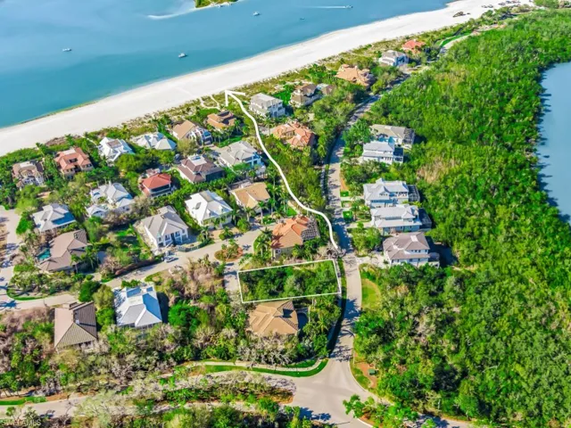 Aerial perspective of suburban area with extended coastline