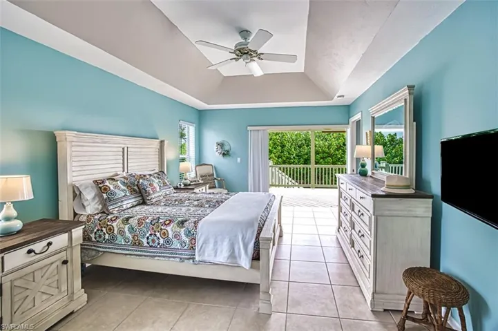 Primary Bedroom with sliders that exit to deck