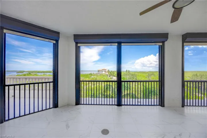 cover screened lanai off dining room with new electric shutter