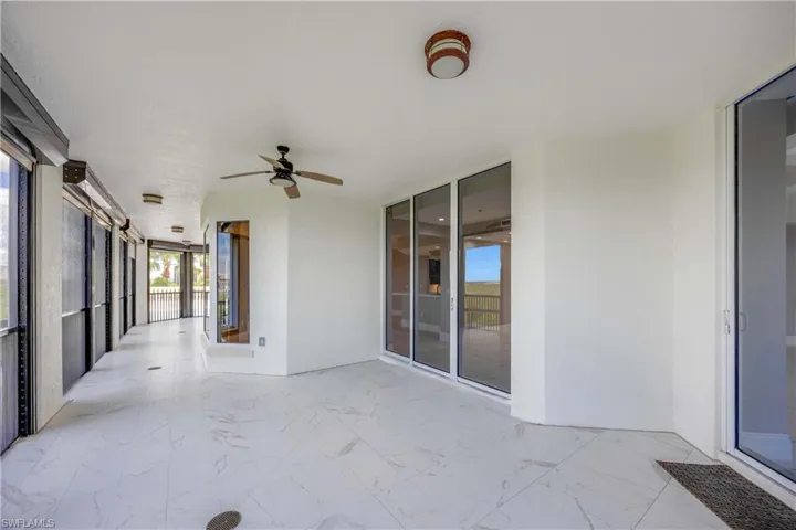 Large covered screen lanai from the dining room back to guest bedroom 1. All with new hurricane shutter