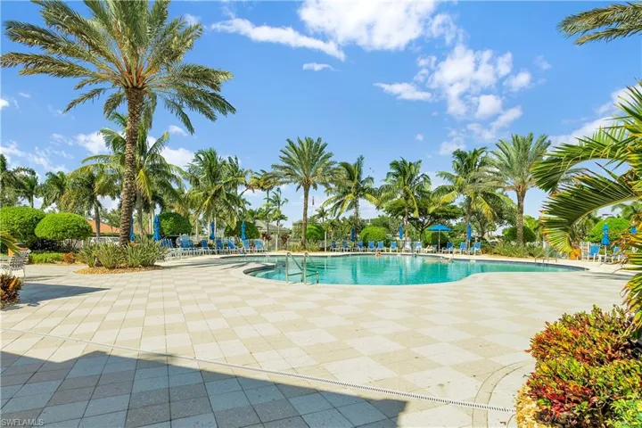 Community pool with a patio area