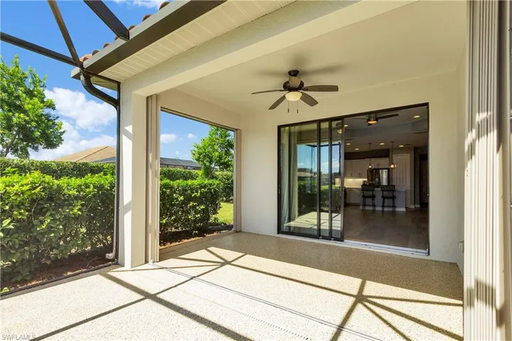 View of patio featuring a ceiling fan
