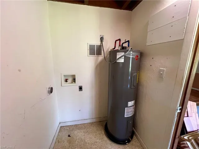 Utility room with electric water heater