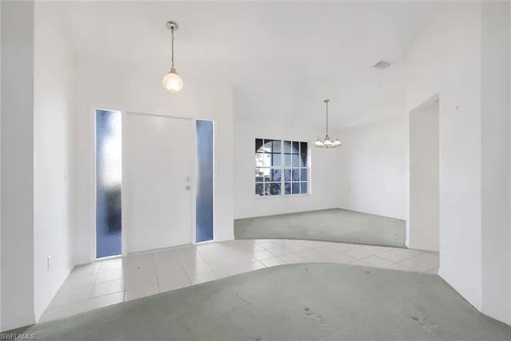 LR Toward Front Door and Dining