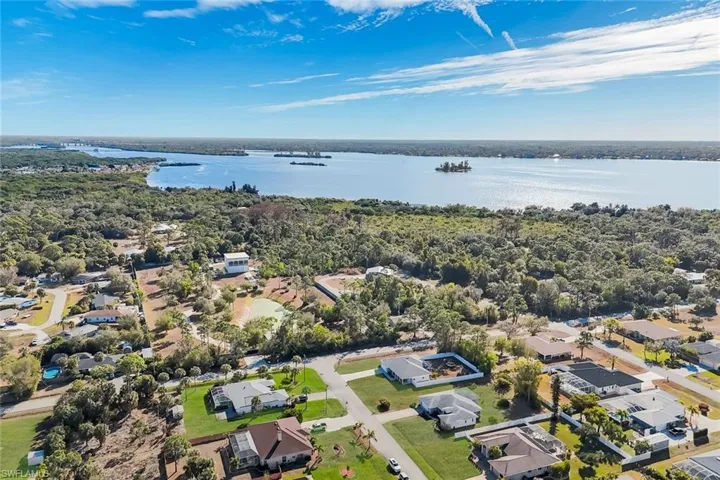 Aerial of neighborhood - wide river view