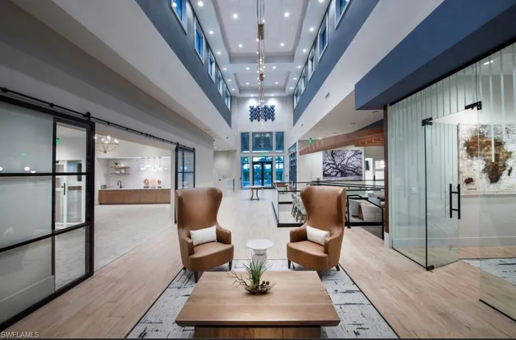 Community lobby with recessed lighting and a high ceiling