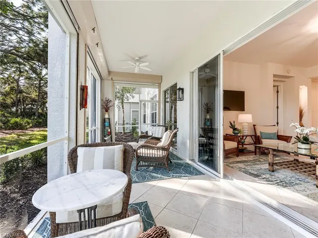 Lanai with a ceiling fan and outdoor lounge area