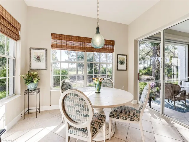Dining space featuring tile patterned flooring and baseboards