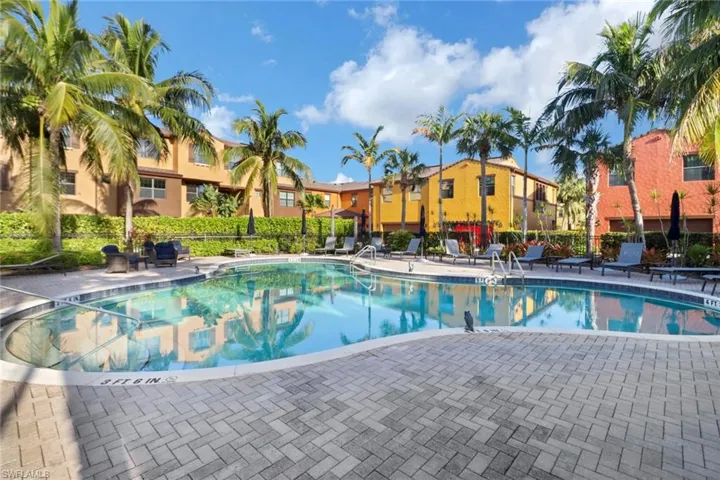 View of swimming pool with a patio area