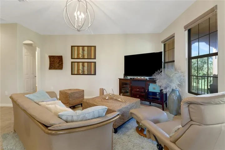 Living room featuring an inviting chandelier