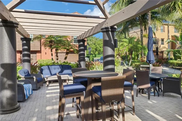 View of patio / terrace with a pergola and an outdoor living space