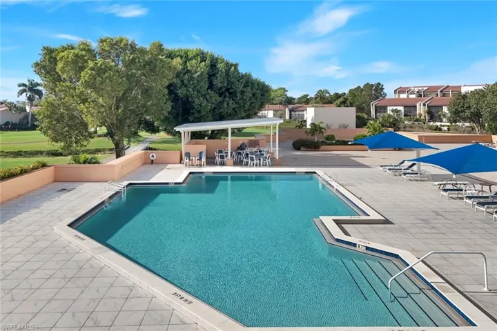 Aerial Pool area, with outdoor grilling under the canopy