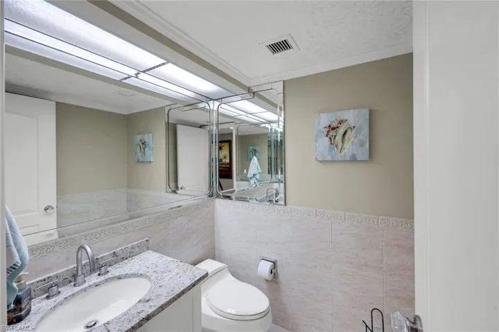 Powder Rm offering guests simple clean environment...all interior doors are updated as well