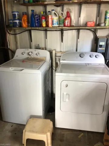 Washroom featuring washer and dryer