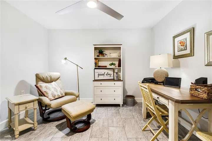 Office area featuring ceiling fan