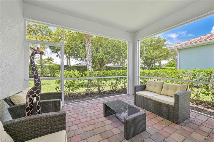 Sunroom featuring outdoor lounge area