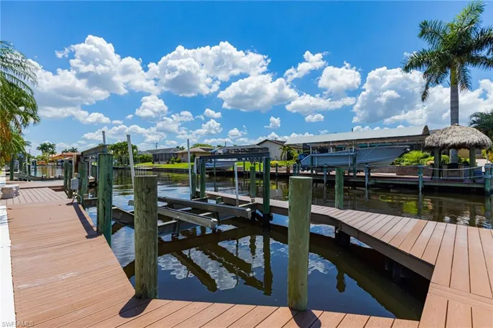 You're going to want  TWO boats as this home Boasts a Double Slip.