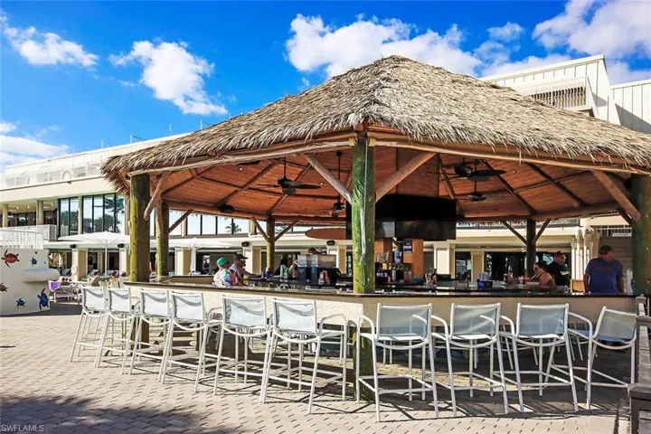 View of patio with a pool bar open to the public