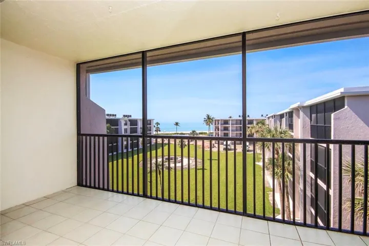 Unfurnished sunroom with a Gulf view
