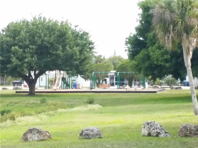 View of home's community featuring a lawn
