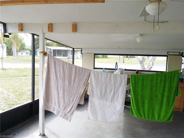 Sunroom / solarium featuring healthy amount of natural light