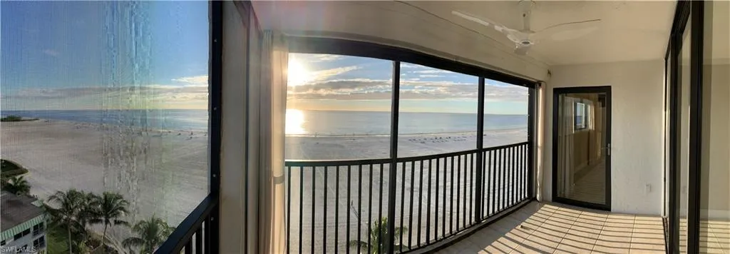Panoramic- Primary bedroom door access, 1oth floor view, electric shutters