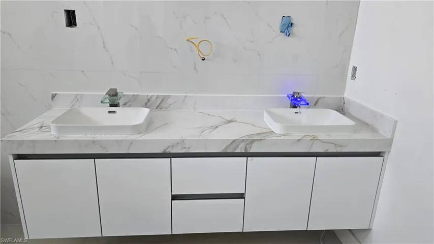 Full bathroom with double vanity