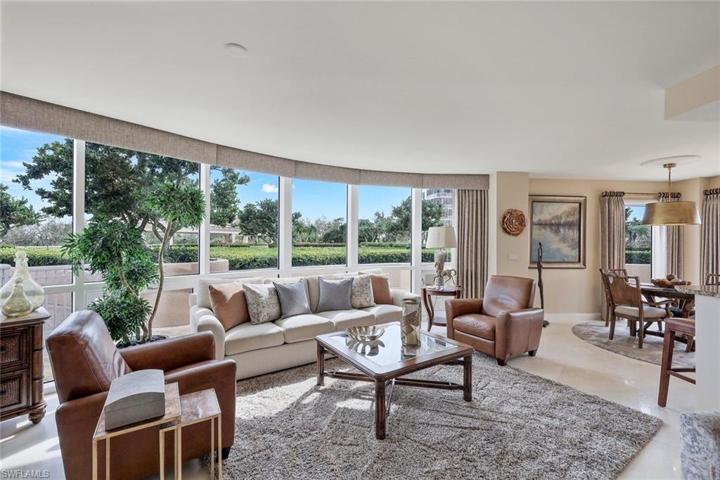 The terrace/lanai wraps around the living, dining and kitchen. The spacious family room is  open to the kitchen.