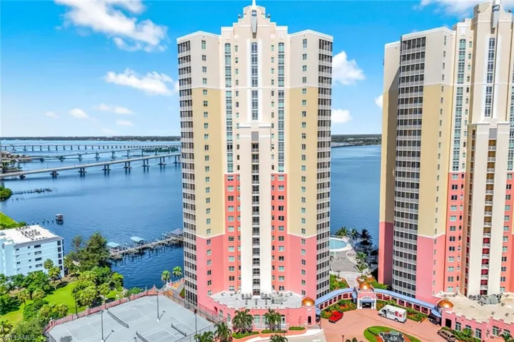 View of apartment building / complex with a water view