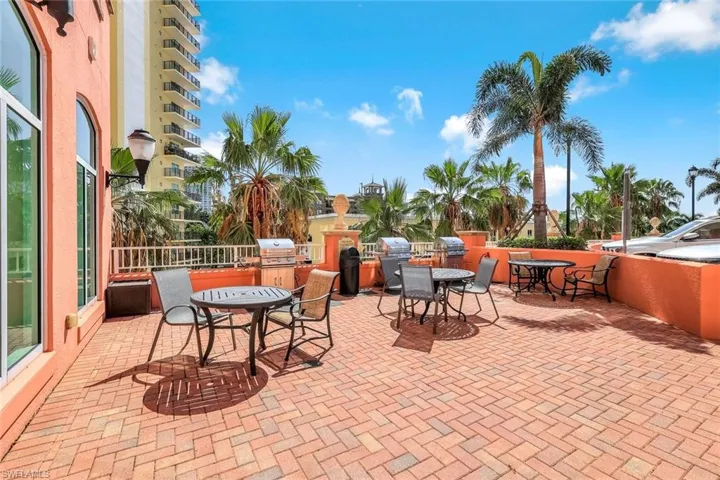 View of patio featuring outdoor dining area and exterior kitchen