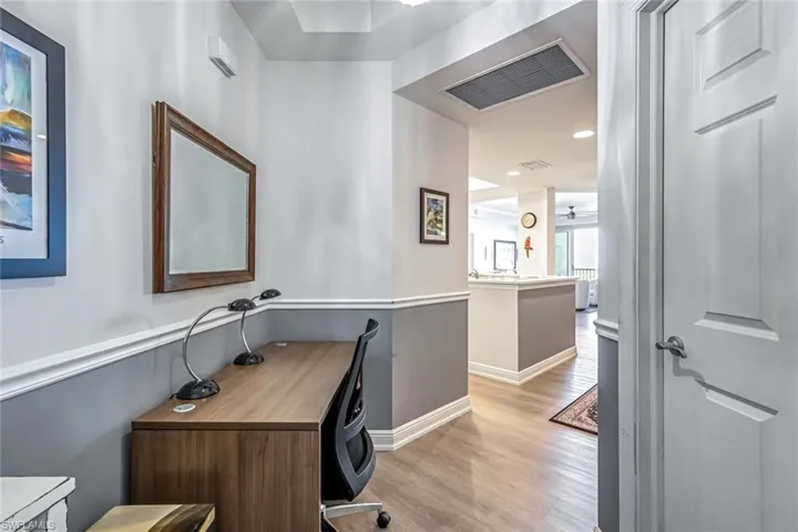 Office featuring light wood finished floors, recessed lighting, and ceiling fan