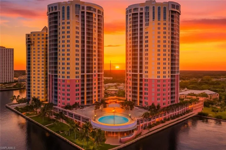 Property at dusk with a water view