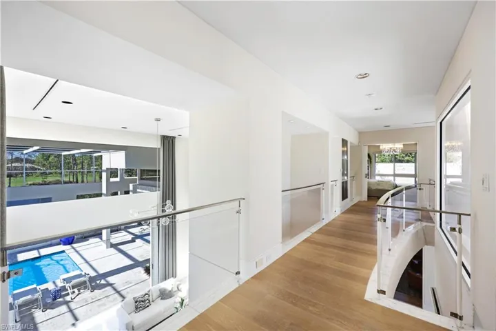 Hall featuring light hardwood / wood-style flooring